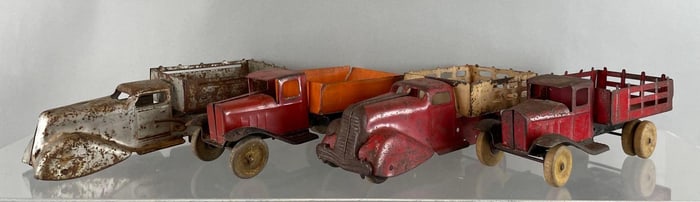 Group of 4 Vintage Pressed Steel Trucks with Wood Wheels