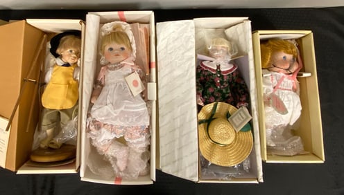 Group of 4 Assorted Porcelain Dolls