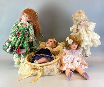 Group of 4 Assorted Porcelain Dolls