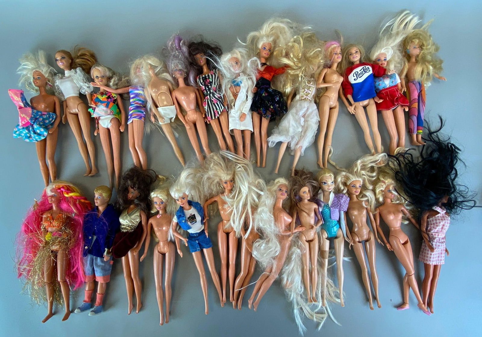 Group of Assorted Mattel Barbie Fashion Dolls: includes 1 ken, each barbie measures 11 1/2 inches tall