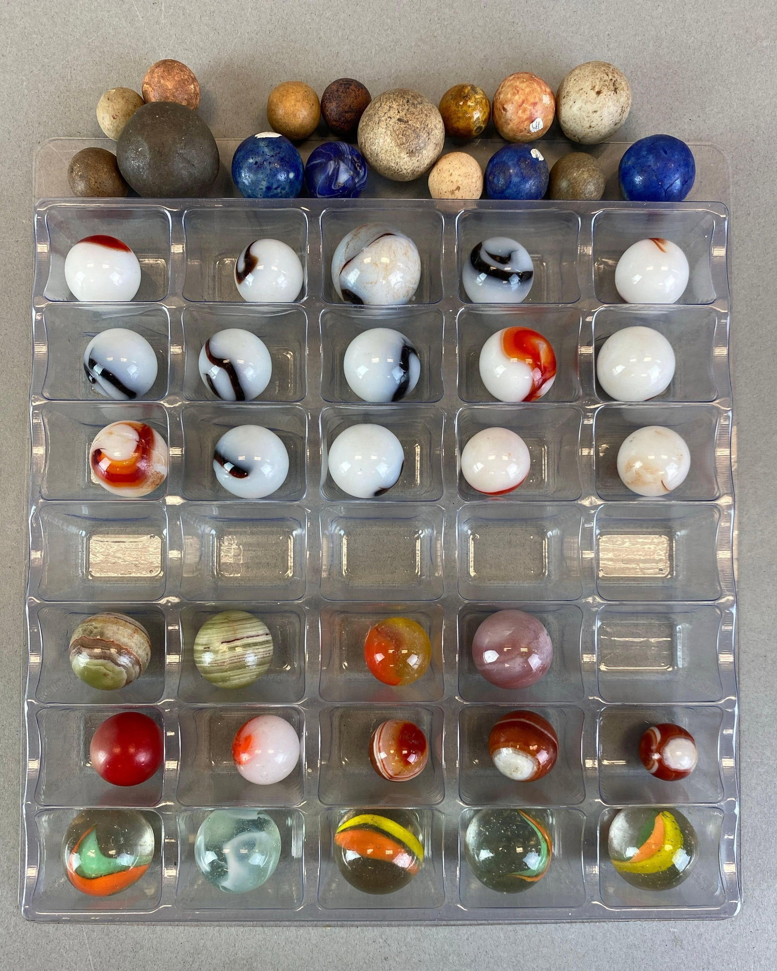 Group of Marbles: Includes Agate marbles, stone and glass, largest measures 1 inches in diameter