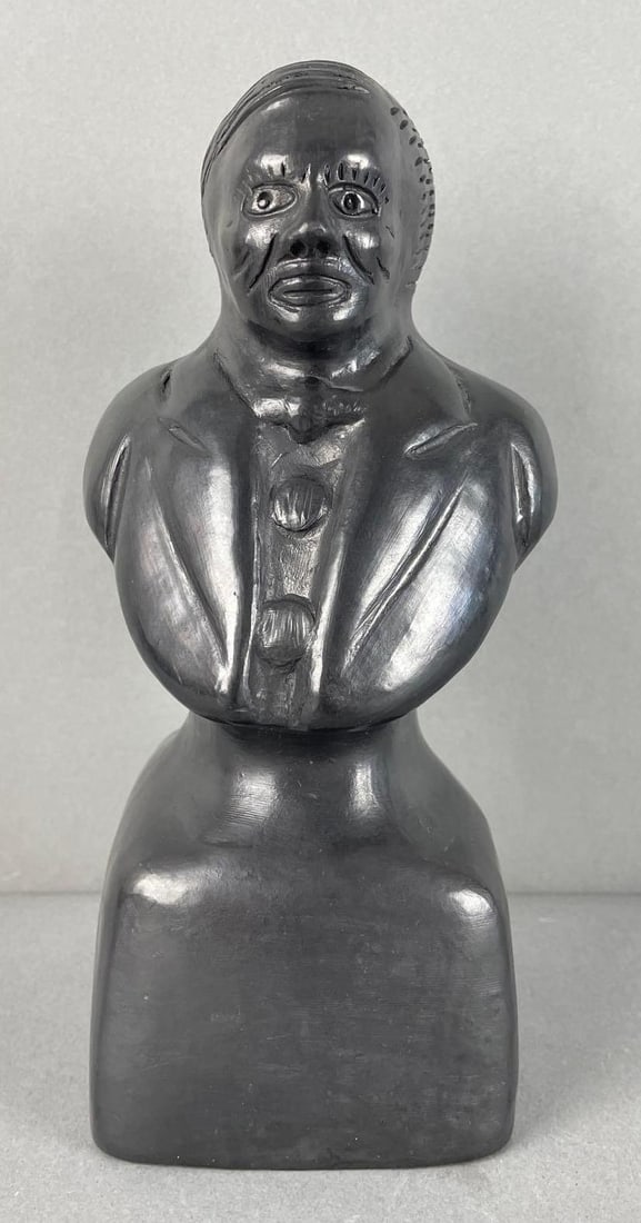 Black Pottery Bust: Measures 7 1/2 x 3 1/2 x 3 1/4 inches
