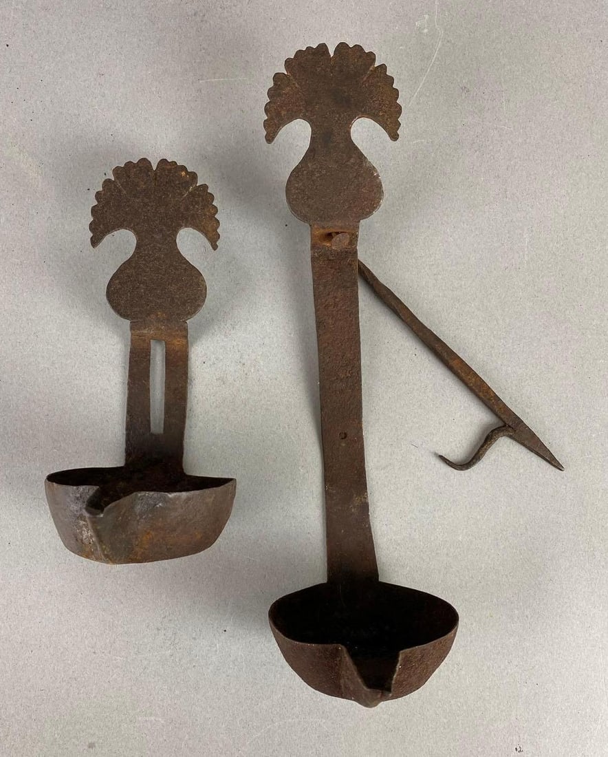 Group of 2 Primitive Oil Lamp: Wear with age. Largest measures 9 x 2 1/2 x 3 1/2 inches.
