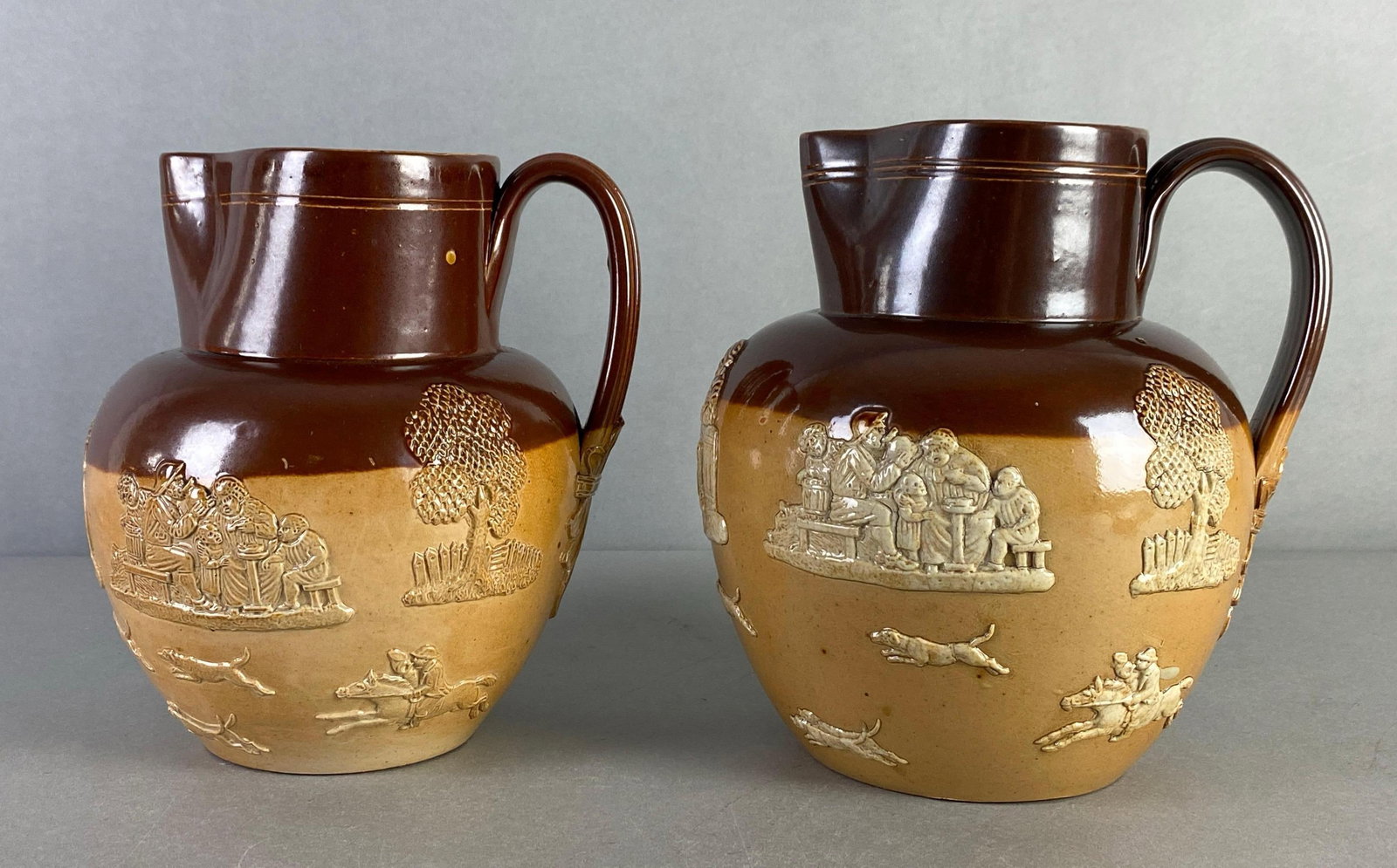 Group of 2 Antique Royal Doulton Relief Stoneware Pitchers (1 of 9)