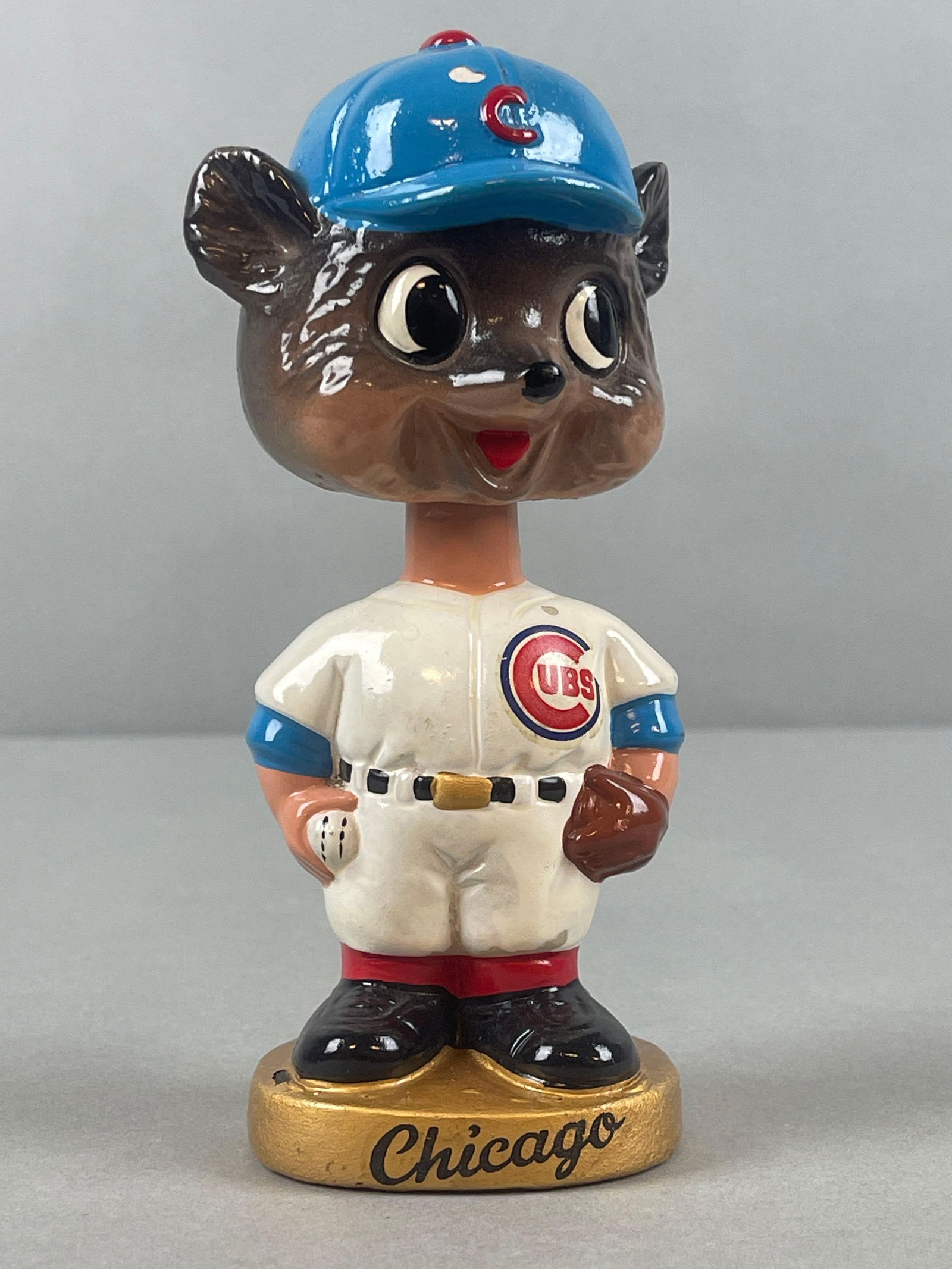 1960s Chicago Cubs Mascot Gold Round Base Bobblehead (1 of 6)
