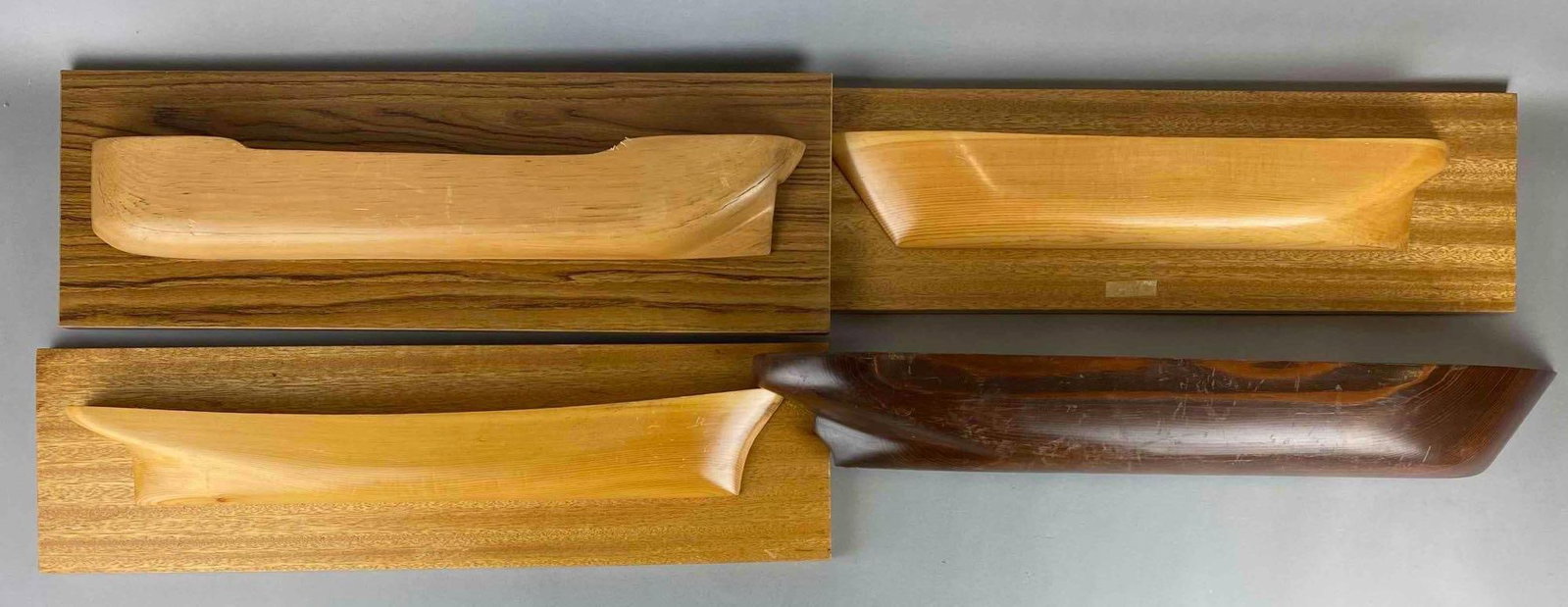 Group of 4 Wood Boat Hull Shelves: Some have scratches. Largest measures 3 x 25 x 4 inches.
