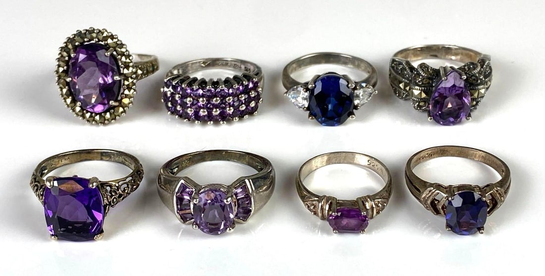 Group of 8 Sterling Silver Rings: Includes amethyst, Sapphire, and CZ, Sizes range from 5 1/4 - 7 1/4.