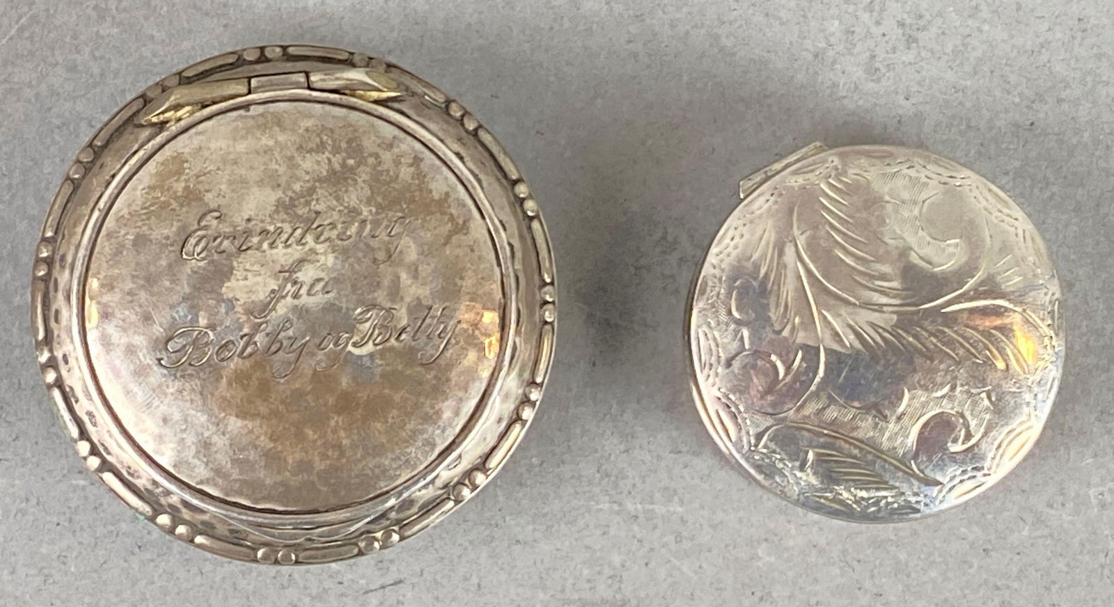 Group of 2 Intricate Sterling Silver Pill Boxes: Wear with age. Largest measures 1/2 x 1 3/4 x 1 3/4 inches