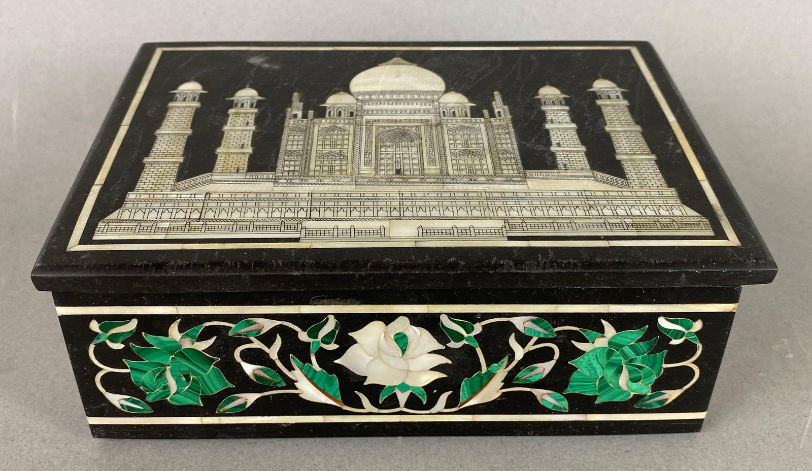 Soapstone with Inlay Taj Mahal Jewelry Box: Has some wear. Measures 2 1/4 x 6 x 4 1/4 inches.