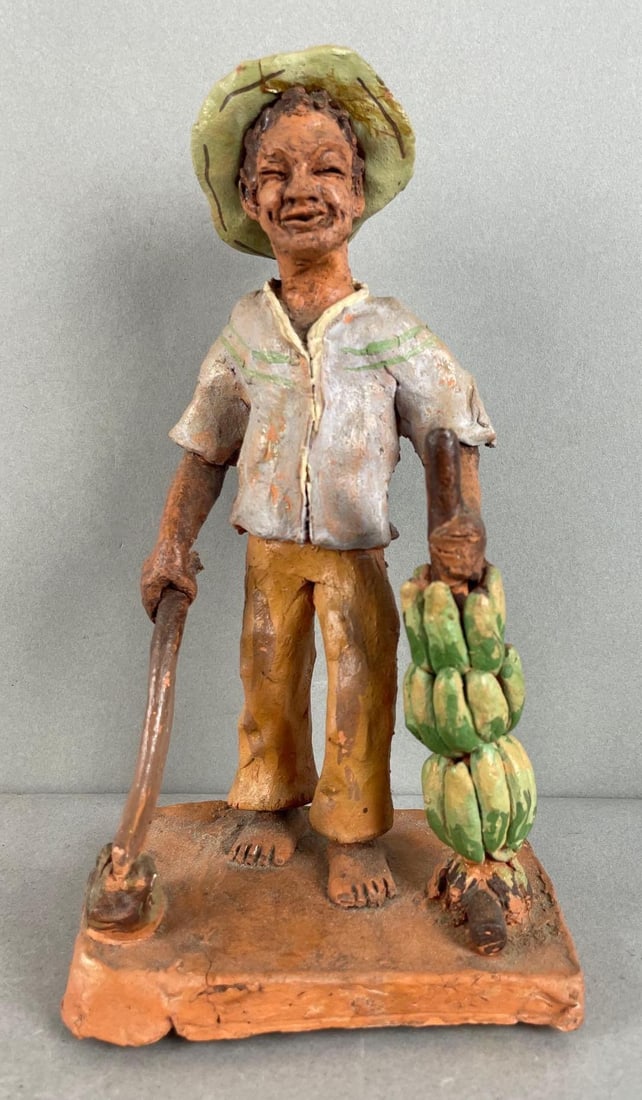 Artist Signed Puerto Rican La Tinaja Pottery Figure: Cara beings, handmade. Measures 8 1/4 inches