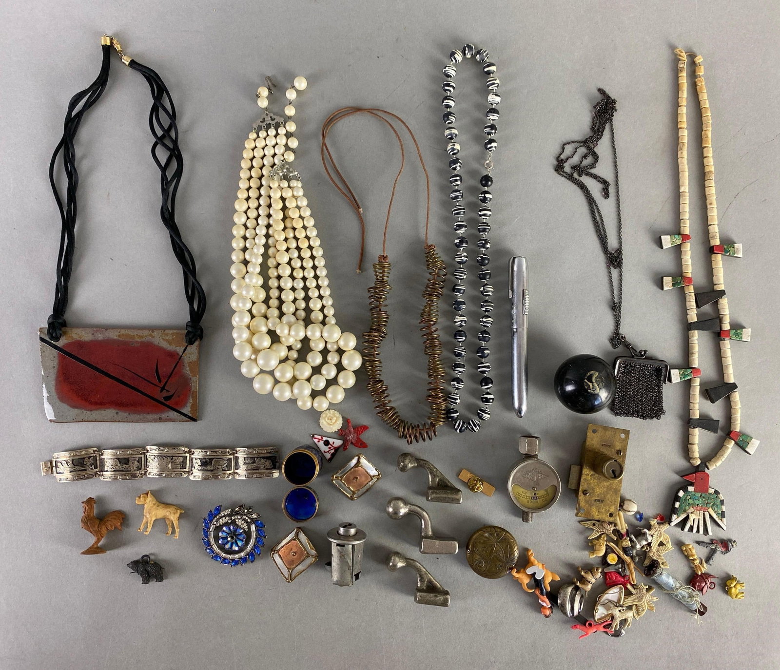 Group of Costume Jewelry and More: Includes Figurines, earrings, necklaces and more, largest measures 14 1/2 inches in length