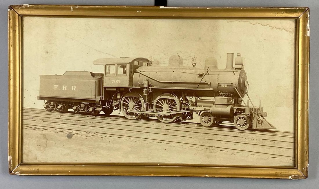 Falls Road Railroad Locomotive Steam Engine No. 705 Print: Some moisture damage around edges, Frame measures 13 1/2 x 23 1/2 inches, Lithograph measures 12 x 22 inches.