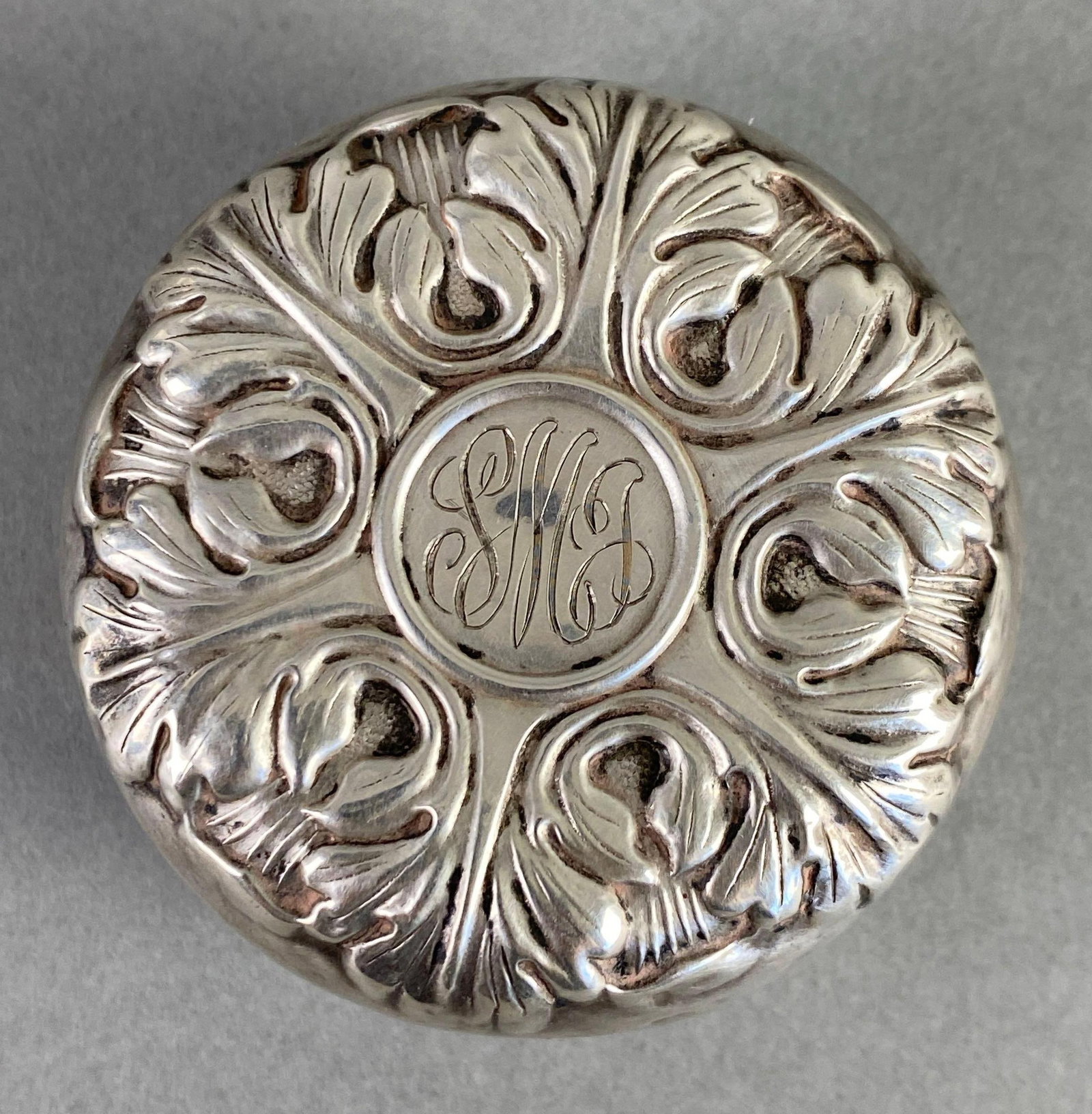 1874 L.S.M. Sterling Silver Over Steel Yo-Yo: Marked on side, initials SMJ on one face, date in other face, measures 2 1/2 x 1 1/2 inches. Sterling Cover Over Steel Body