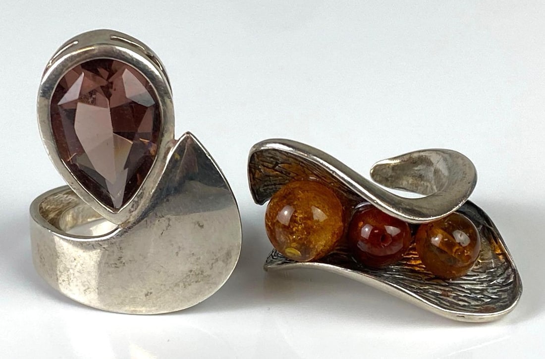 Group of 2 Sterling Silver Modernist Art Rings: Includes sizes 6 3/4, and 7 1/4, One with purple CZ, One with faux amber beads.