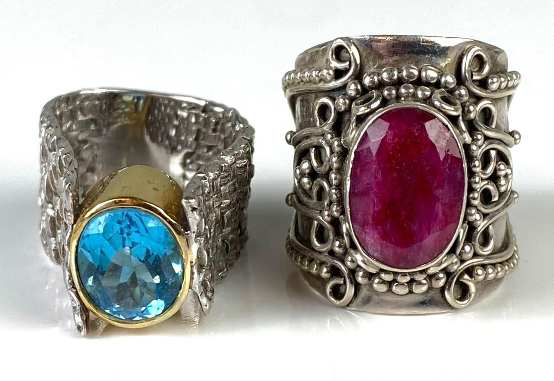 Group of 2 Sterling Silver Rings: Sizes include 7, and 8 1/2, Includes blue topaz, and