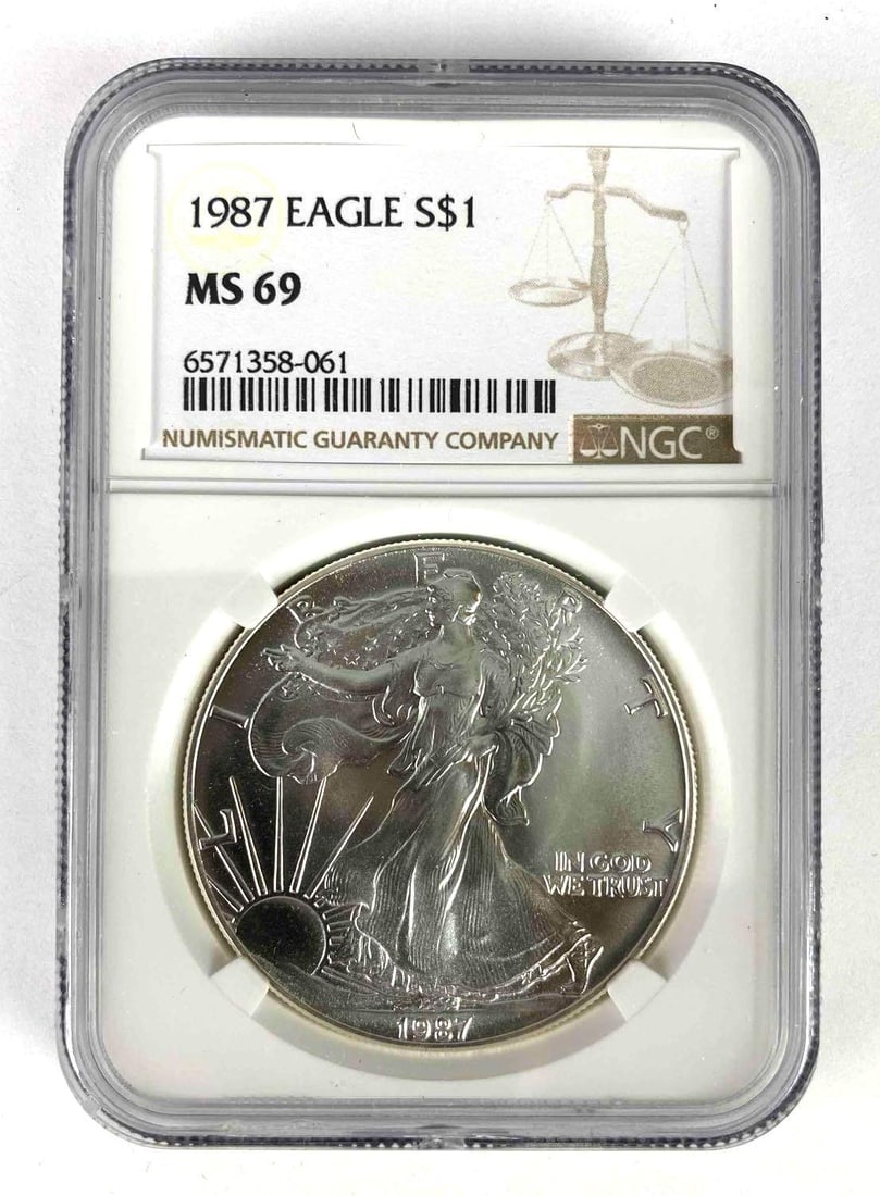 1987 NGC Graded MS69 American Silver Eagle 1 Oz. Fine Silver Dollar (1 of 2)