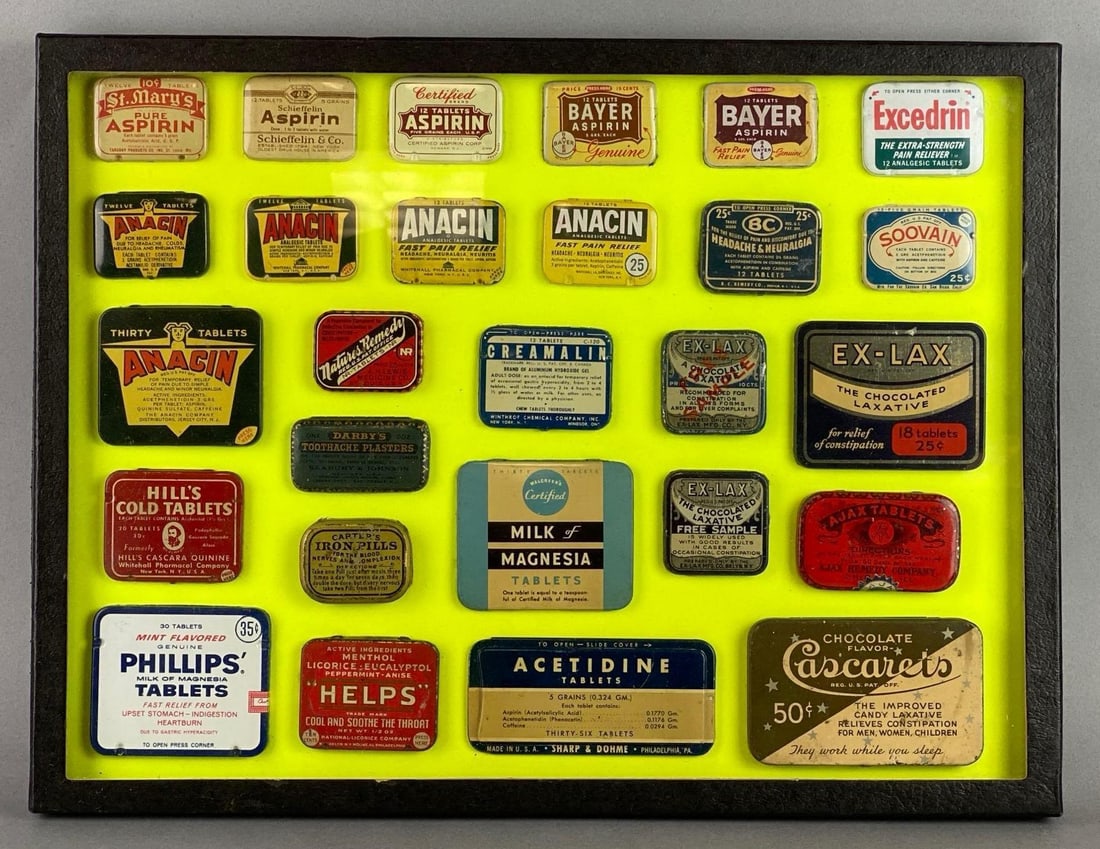 Framed Antique Medicine Tins: Includes Excedrin, Anacin, Bayer and more. Frame measures 12 1/4 x 16 1/4 x 3/4 inches.