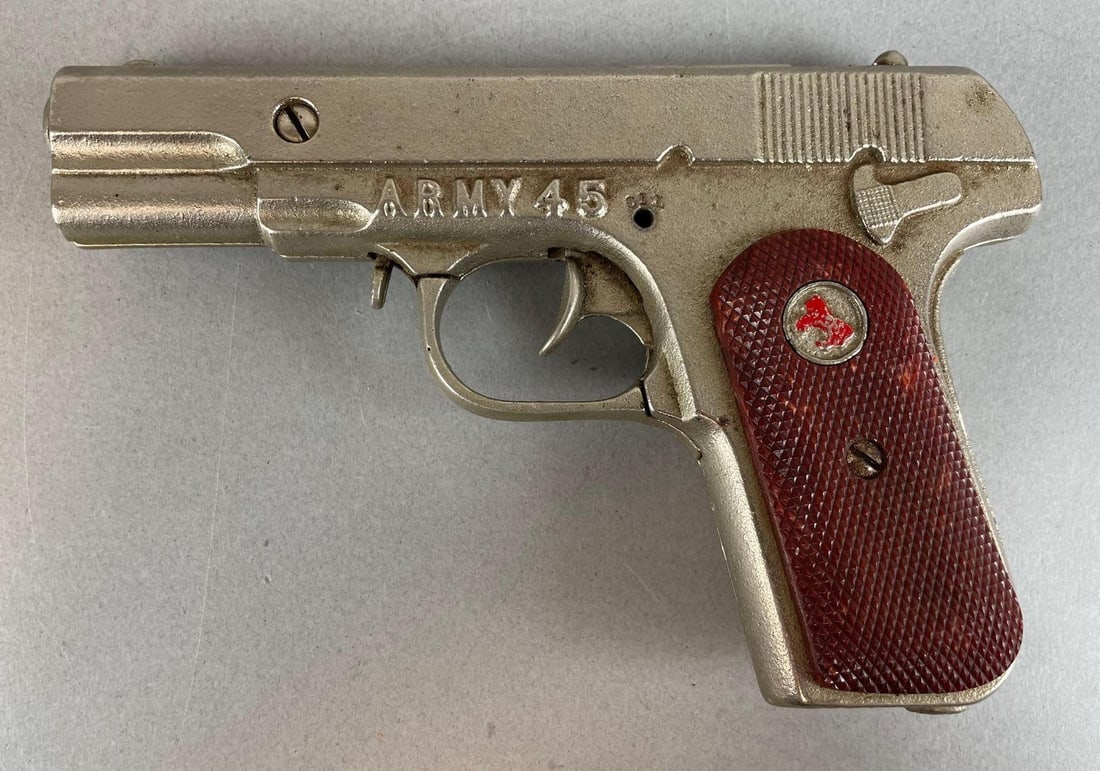 Vintage Hubley Champ Army 45 Cap Gun: Working mechanism, measures 6 1/2 x 4 1/4 inches