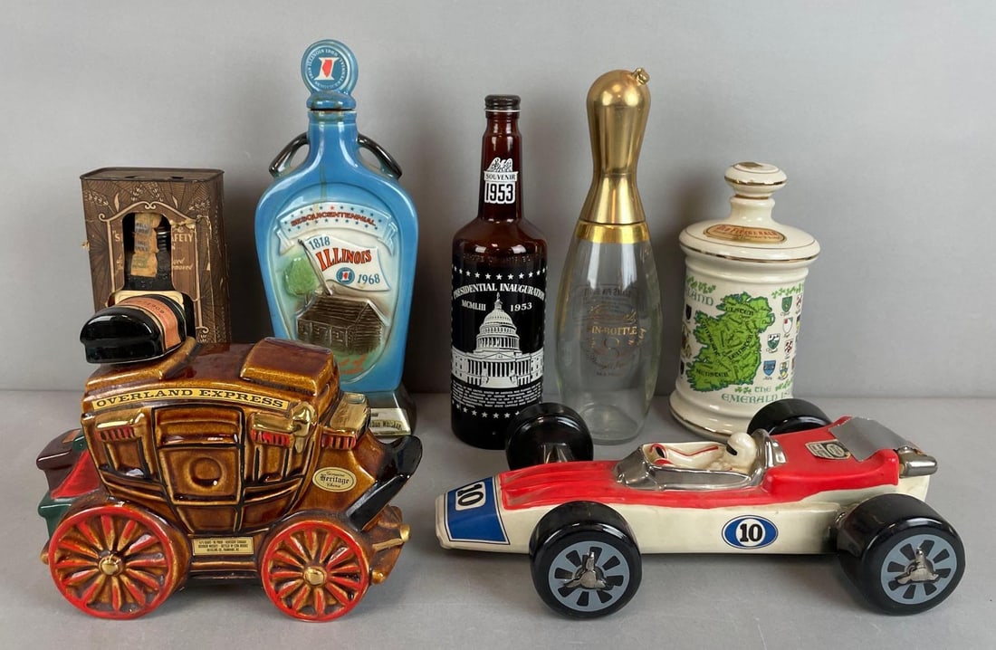 Group of Vintage Ceramic Whiskey Decanters and Bottles: Includes Beam Illinois, Ezra brooks racecar, and more. Tallest measures 13 inches