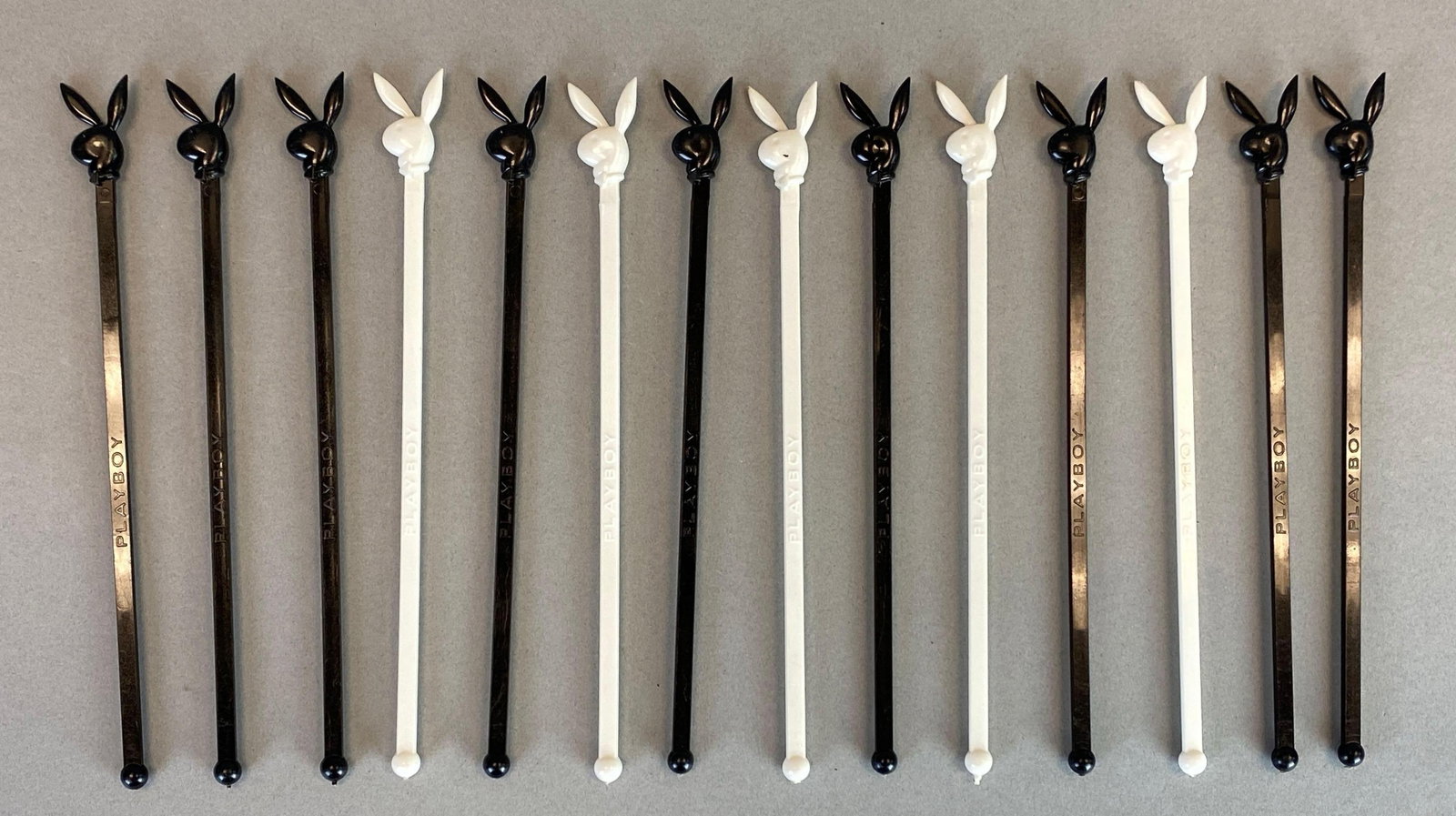 Group of Playboy Bunny Drink Stirrers: includes black and white variants, each measures 8 inches in length