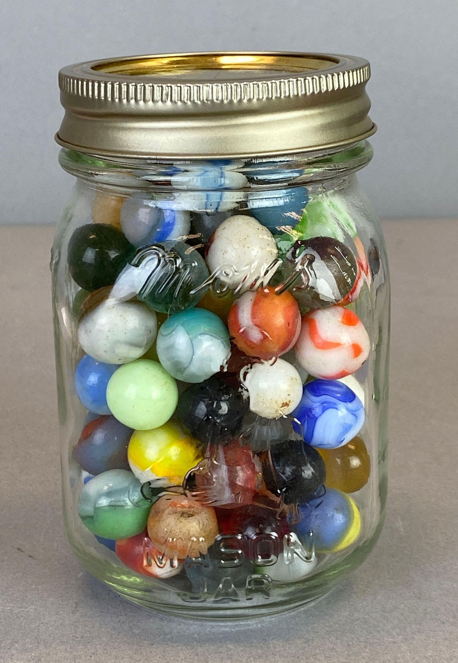 Glass Jar of Assorted Glass Marbles (1 of 6)