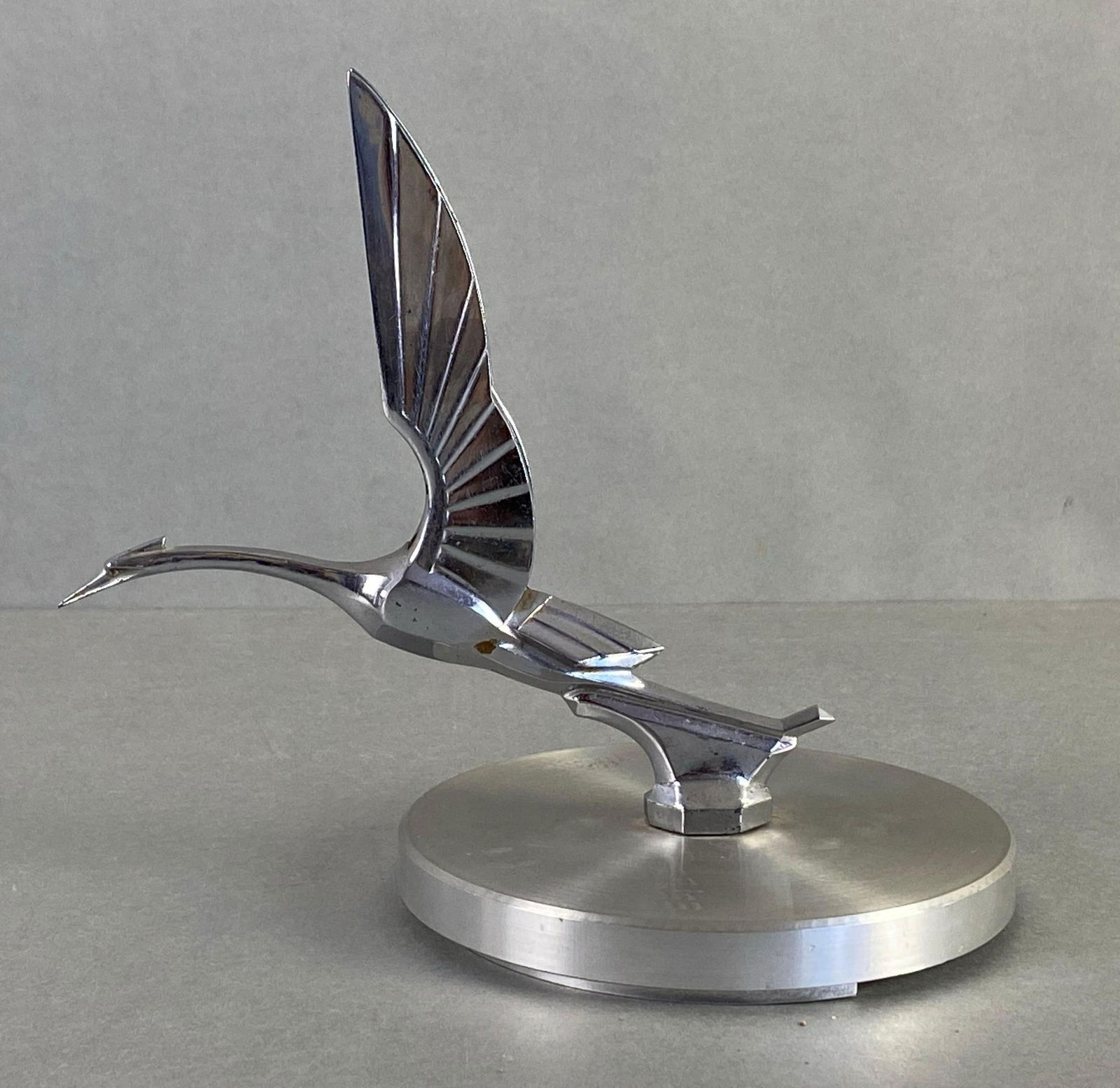 Vintage Automobile Hood Ornament: Features modern machined display base, Measures 7 1/4 x 8 1/2 x 5 1/2 inches