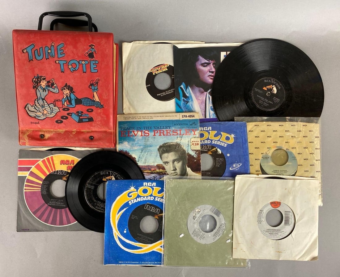 Vintage Tune Tote and Assort 45 Vinyl Records: Includes Aaron Tippin, Tanya Tucker, Elvis Presley and more. Largest item measures 7 1/2 x 11 x 3 1/2 inches.