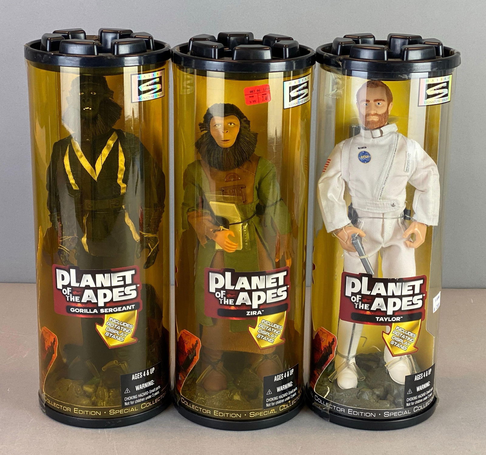 Group of 3 1999 Hasbro Planet of the Apes Action Figurs: In original sealed tubes, includes zira, Taylor and Gorilla sergeant, each measures 14 1/4 x 5 inches