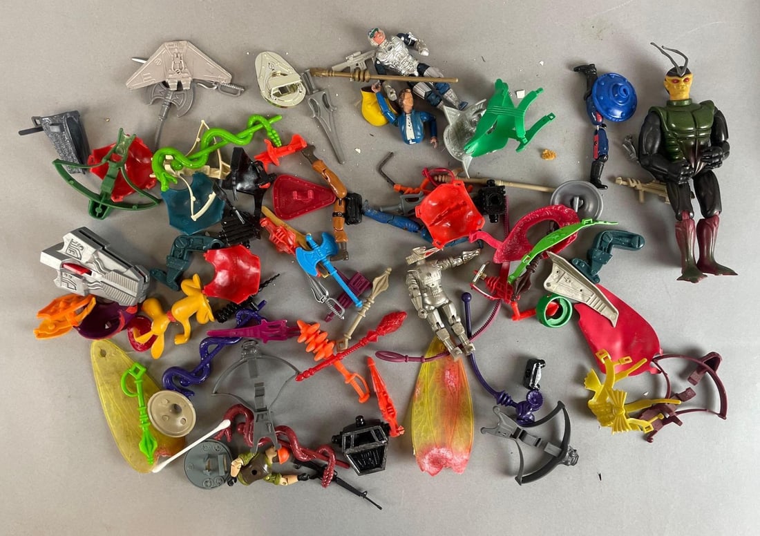 Group of 1980s Mattel Masters of the Universe Accessories and More: Includes weapons, armor, brain figure, and more