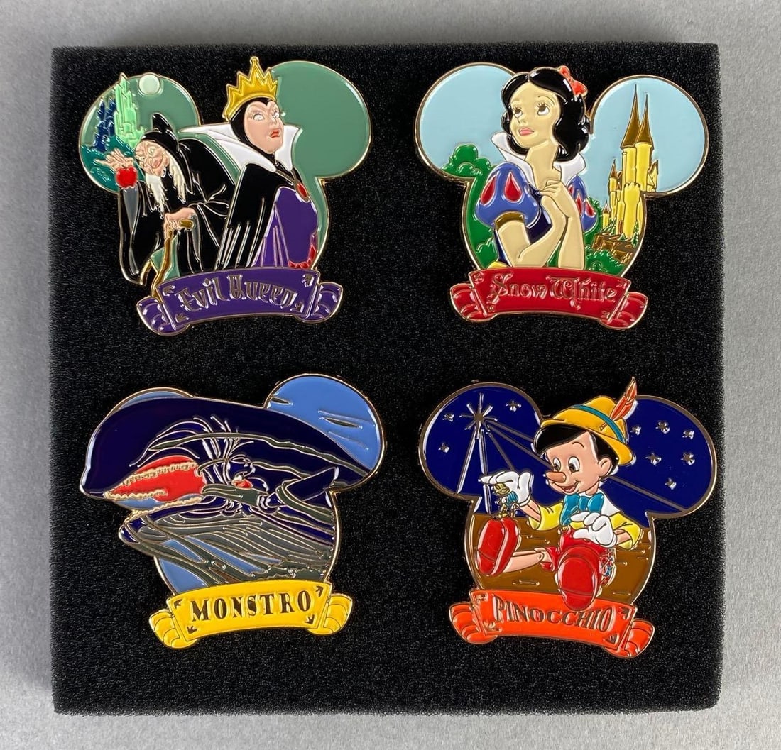 Set of 4 Disney Magical Moments Enamel Pins: With COA, Includes Snow White, The Evil Queen, Pinocchio, and Monstro, Box measures 5 1/4 x 5 1/4 x 1 inches.