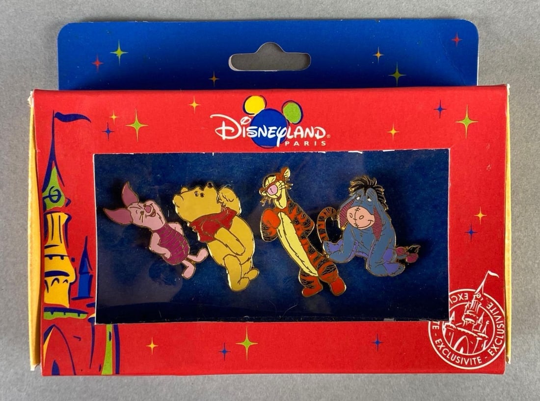 Disneyland Paris Winnie the Pooh and Friends Enamel Pin Set: Set of 4 pins, Includes Piglet, Pooh, Tigger, and Eeyore, Packaging measures 3 3/4 x 4 3/4 x 1 inches.