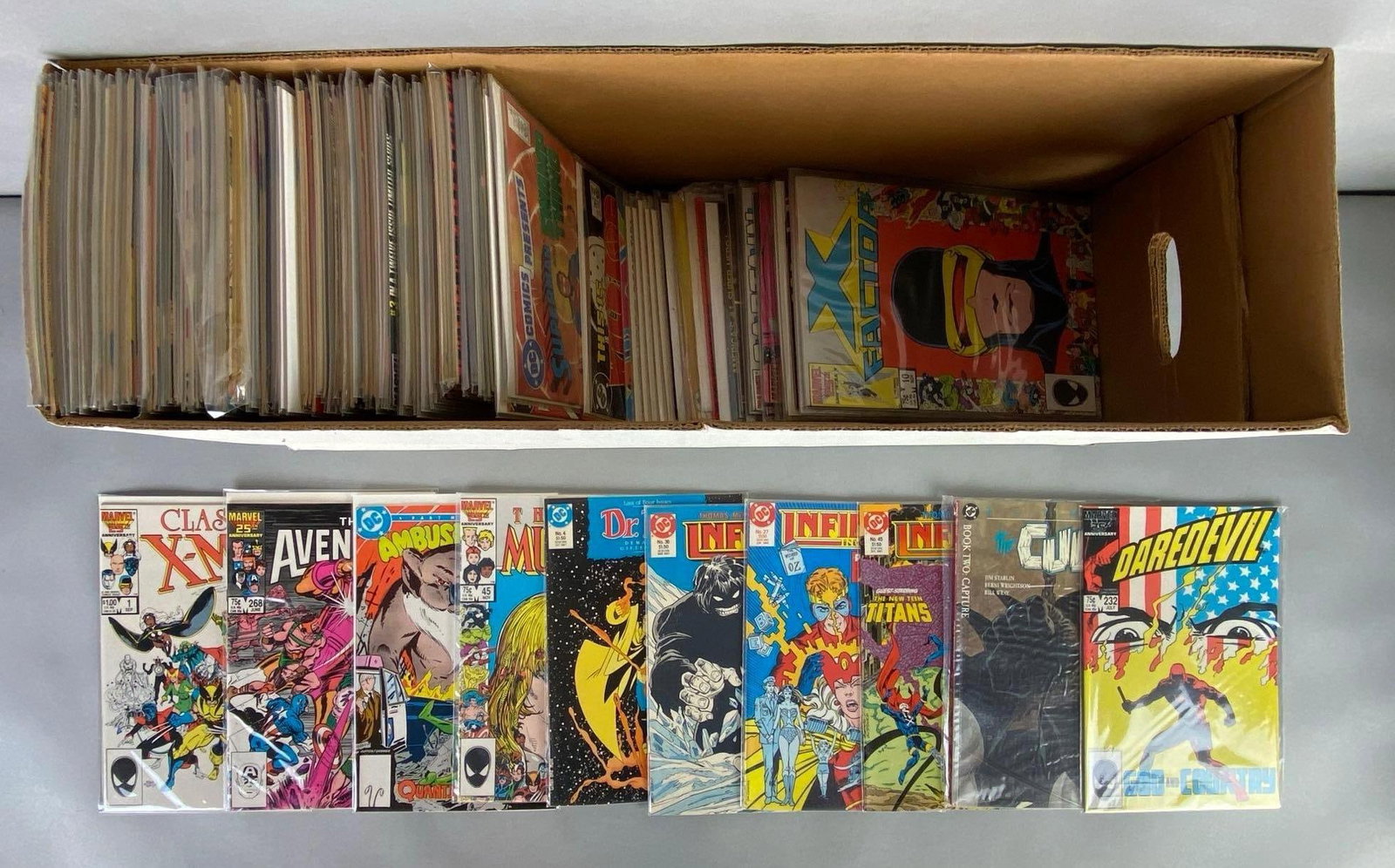 Long Box 130+ of Marvel/DC/Assorted Comic Books: Includes Daredevil, Batman, Dr. Fate, The Flash, Power Pack, and more, Modern Age, Most bagged.