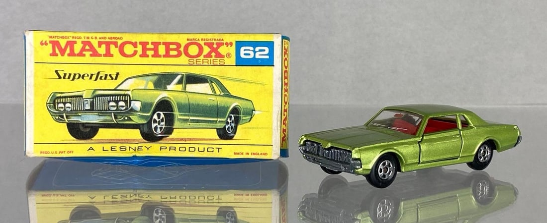 Matchbox No. 62 Mercury Cougar Superfast: Produced 1970, A Lesney Product, With original box, Metallic green body, Red interior, Clear windows, silver vase, Black plastic wheels, Die-Cast, Made in England.