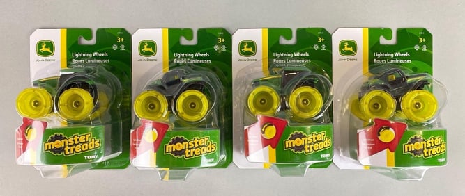 Group of 4 Tomy John Deere Monster Tread Gator
