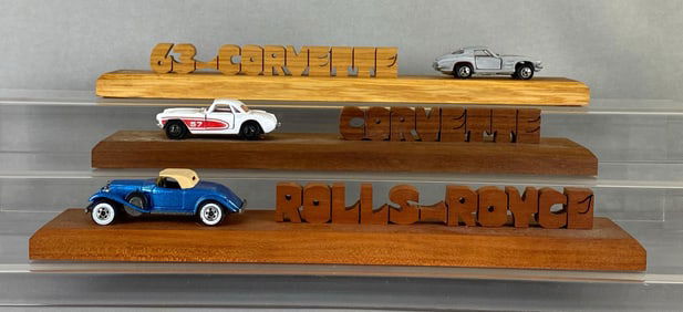Group of 3 Die-Cast Cars on Wood Displays