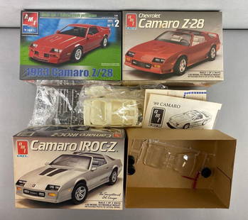 Group of 3 AMT ERTL Chevrolet Camaro Model Car Kits: 1/25 Scale. 2 are Factory sealed one is not. Complete sets. Includes 1983 Camaro Z28, Camaro IROC-Z and Camaro Z-28. Largest box measures 6 3/4 x 9 1/4 x 3 3/4 inches