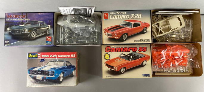 Group of 4 Chevrolet Camaro Model Car Kit: 1/25 Scale. One is factory sealed and 3 are opened. Includes MPC ERTL 1969 Camaro SS, Revell 1969 Z-28 Camaro RS, AMT ERTL 1970 1/2 Baldwin Motion Camaro and more. Largest box measures 6 1/2 x 9 1/4 x