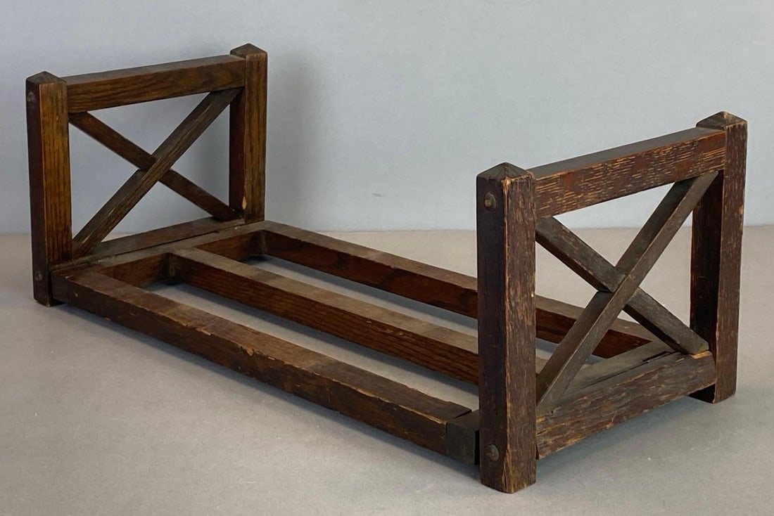 Arts and Crafts Oak Book Holder: One side stands farther out than other, Some cracks on one side from applied weight over time, Measures 6 x 18 1/2 x 7 1/2 inches standing.