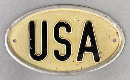 1960’s USA International Oval License Plate