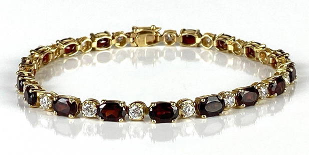 10K Gold Garnet and CZ Tennis Bracelet: Total weight 8.7g, Measures 7 inches long.