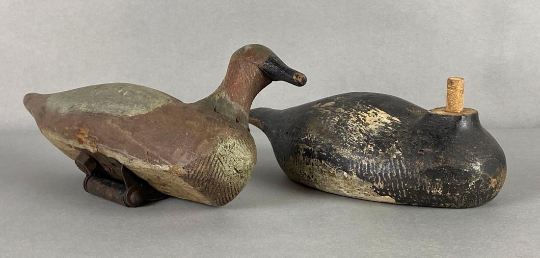 Group of 2 Vintage Wood Duck Decoys: One missing head, Largest measures 6 3/4 x 13 x 3 1/2 inches.