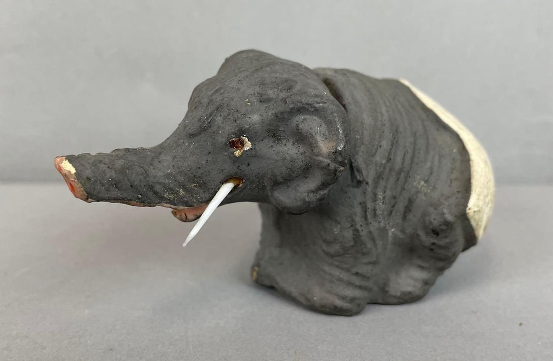 Antique Elephant Egg Candy Container: Missing eye and tusk. Measures 4 inches long