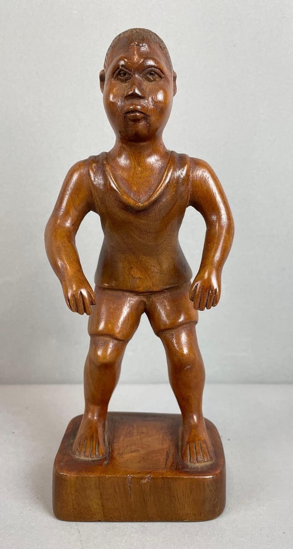 Carved Wood African Boy Sculpture: Measures 8 1/2 inches tall