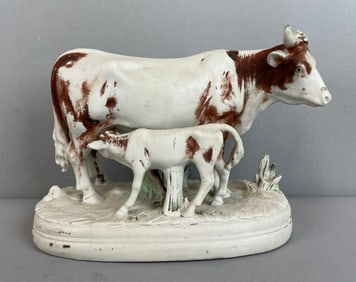 Vintage Staffordshire Cow with Feeding Calf Bisque Figure