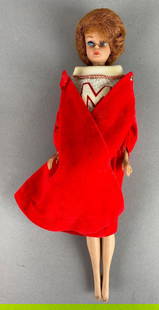 Vintage 1958 Mattel Barbie Bubble Cut Fashion Doll: Red hair. Has some discoloration. Measures 12 inches tall.