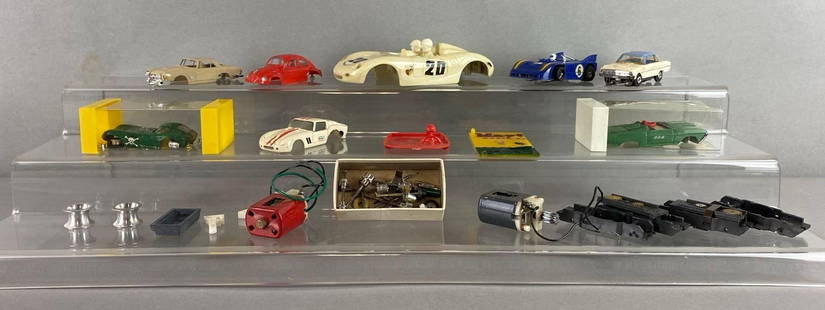 Group of Assorted Slot Car Items and More: Includes Motors, Axels. car shells and more.