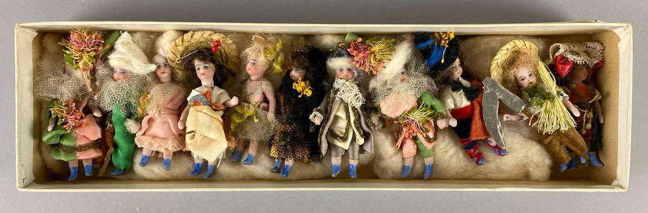Group of 11 Vintage Porcelain Bisque Miniature Dolls: Includes farmer, jester, Clown and more. Largest measures 2 1/2 x 1 x 3/4 inches.