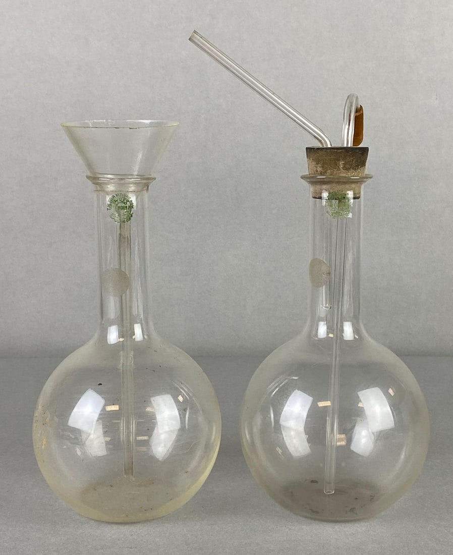 Group of 2 Pyrex Chemistry Flasks and Accessories: Some fleabites, Flasks measure 7 1/2 x 4 x 4 inches.