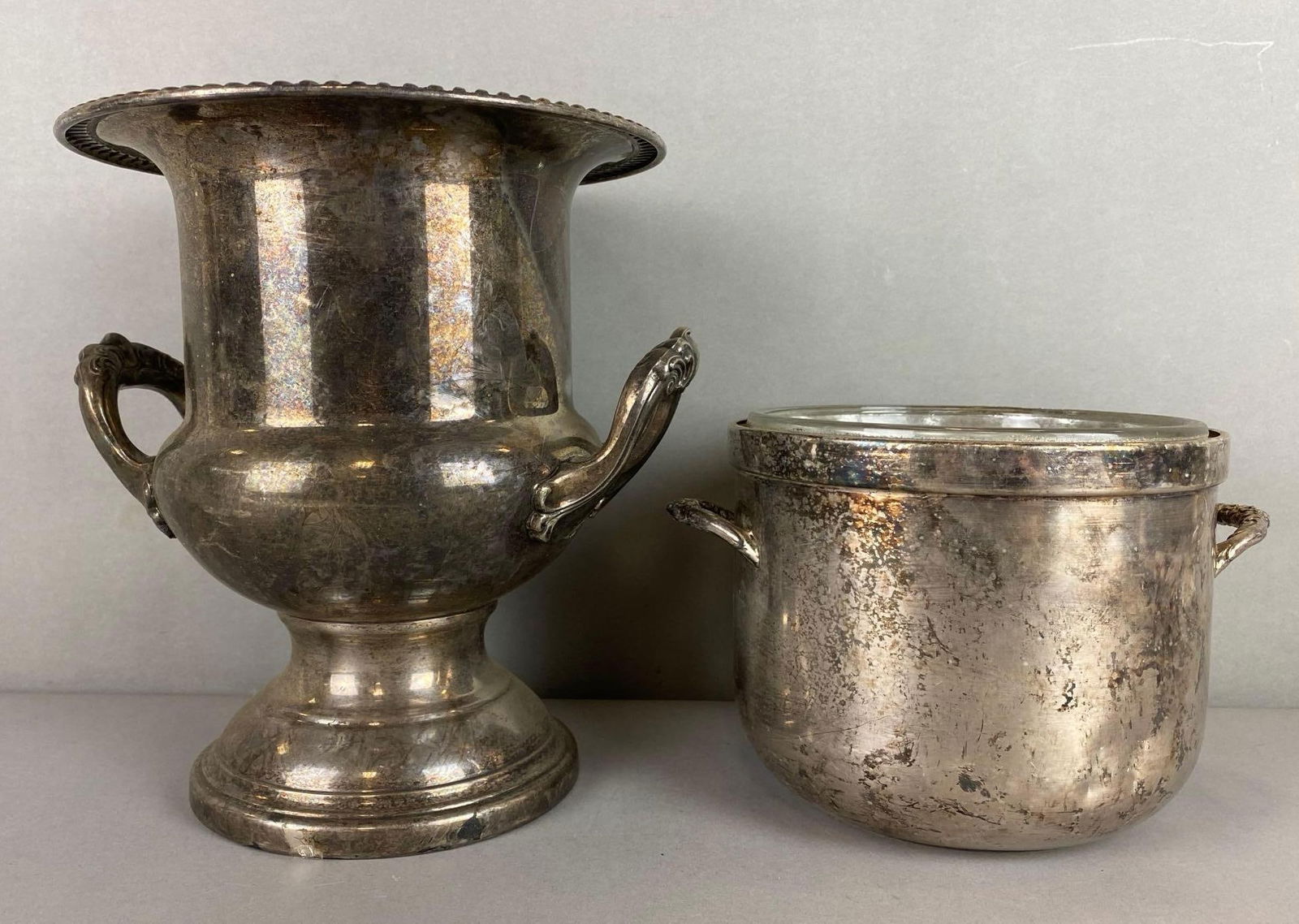 Hotel/Railroad Silverplated Champagne Bucket and Ice Bucket: Ice bucket has a Pyrex insert.both are tarnished. Largest item measures 10 x 9 x 9 inches.