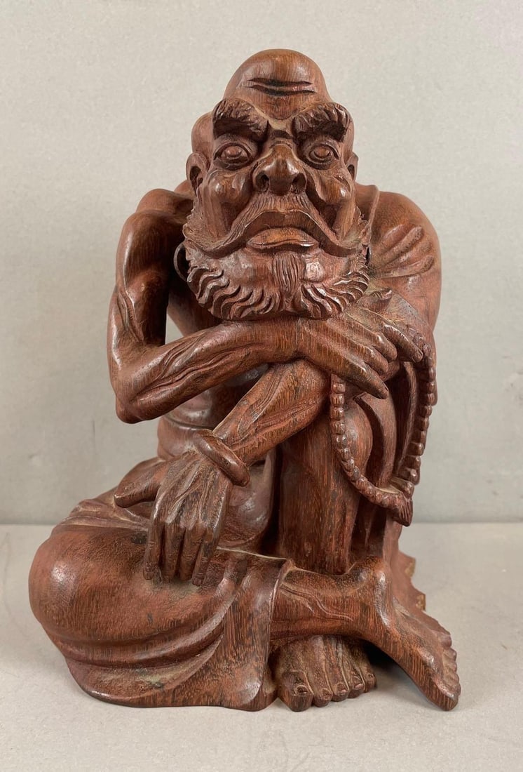 Asian Carved Wood Buddha Statue: Missing part of cloth on base, measures 7 1/2 inches tall